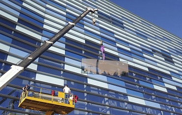 Остекление фасада здания закрытого стадиона